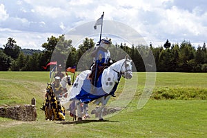 Jousting knights, warriors, fighters riding horses