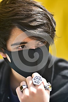 Portrait of young man with face mask photo