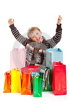 Jovial Boy with Shopping Bags photo