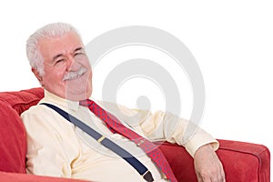 Jovial senior man with a lovely beaming smile photo