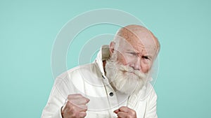 Jovial Senior Threatening Playfully with Fists