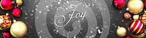 Joy and Christmas,fancy black background card with Christmas ornament balls, snow and an elegant word Joy, 3d illustration