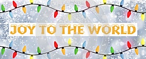 Joy to the world - A snowflake background banner with multiple colour Christmas Tree lights