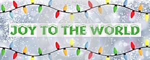 Joy to the world - A snowflake background banner with multiple colour Christmas Tree lights