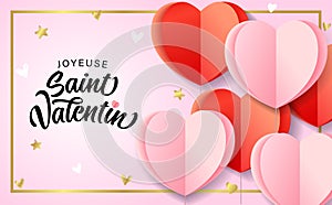 Joyeuse Saint Valentin with flying origami paper hearts photo