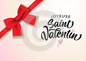 Joyeuse Saint Valentin with satin decorative red bow photo