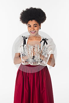 joyful african american bavarian waitress in