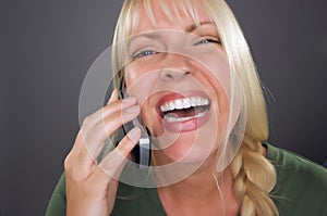 Joyful Blond Woman Using Cell Phone