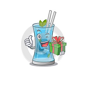 Joyful blue hawai cocktail cartoon character with a big gift box