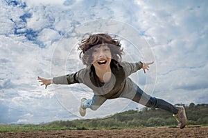 Joyful boy in flight