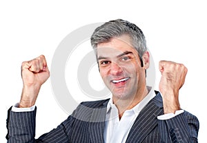 Joyful businessman punching the air in celebration