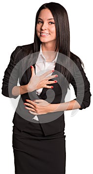 Joyful businesswoman holding hands on his chest