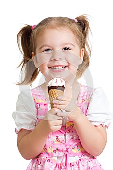 Joyful child girl eats ice cream in studio isolated