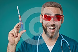 Joyful Doctor With Injector