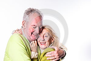 Joyful Elderly Couple Embracing Lovingly