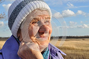 Joyful, an elderly woman