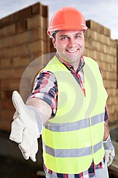 Joyful engineer doing welcoming gesture