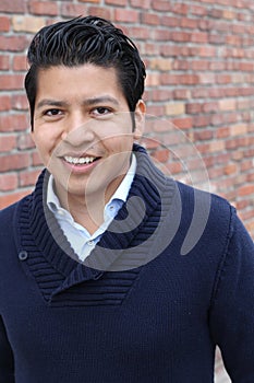 Joyful ethnic male smiling