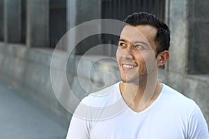 Joyful ethnic male smiling isolate with copy space