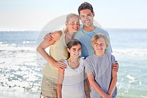 Joyful family at the beach