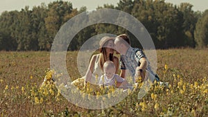 Joyful family enjoying their picnic in nature