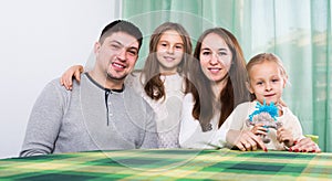 Joyful family with two children