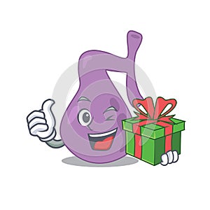 Joyful gall bladder cartoon character with a big gift box