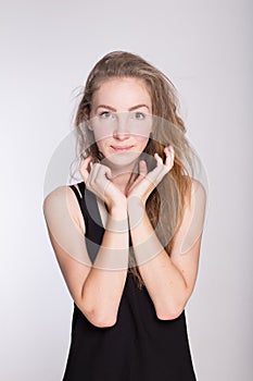 Joyful girl in a black dress