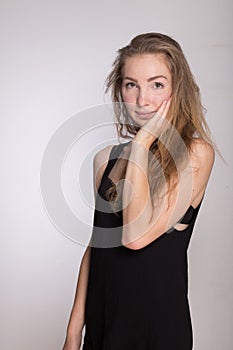 Joyful girl in a black dress