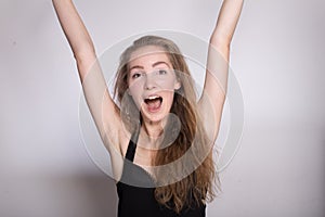 Joyful girl in a black dress