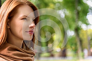 Joyful girl dreaming in park