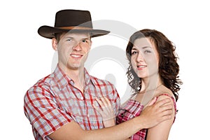 Joyful girl and a guy in a stetson