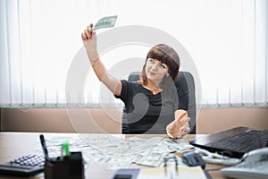 Joyful and happy young Business Woman in office