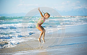 Joyful jumping on the sea