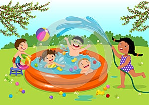 Joyful kids playing in inflatable pool in the backyard