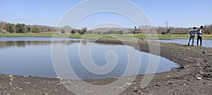 Joyful Lakeside Adventures: Kids Playing by the Water