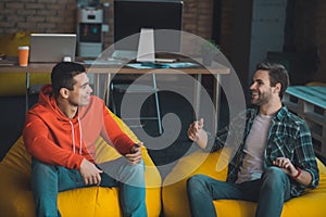 Joyful nice men enjoying their pleasant conversation