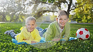 Joyful Playtime: Brothers with a Soccer Ball in the Park