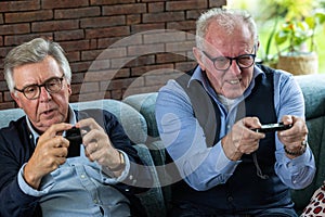 Joyful Rivalry: Senior Friends Engaging in Video Games