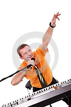Joyful singer with synthesizer and microphone