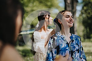 Joyful sisters enjoying a sunny day in the park, sharing laughter and stories