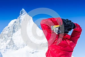 Joyful ski vacation on the background beautiful mountains and blue sky