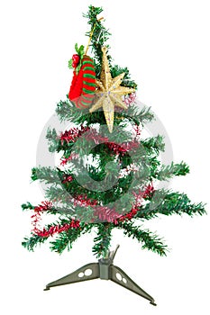 Joyful studio shot of a Christmas tree with colorful ornaments,