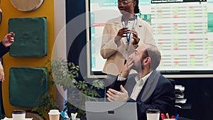 Joyful supervisor accidentally kissing his employee in excitement