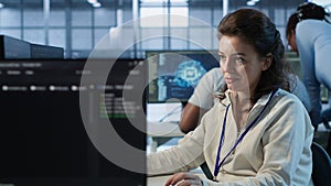 Joyful technician working in high tech data center workspace