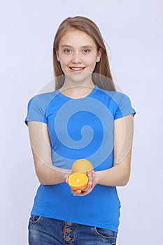 Joyful teen girl with orange