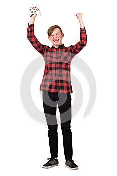 Joyful teenage boy playing video games isolated over white background celebrating success raising hands up screaming, holding the