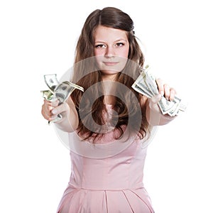 Joyful teenage girl with dollars in her hands