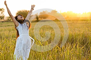 Joyful woman in a field