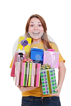 Joyful woman with gift boxes